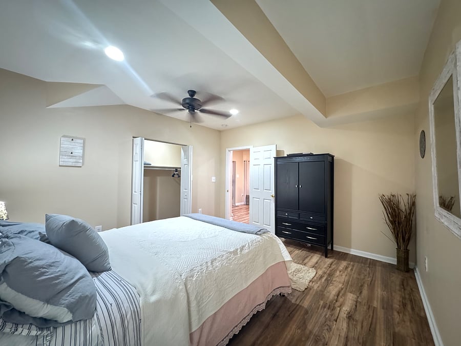 Bedroom #2 (view 2); walk-in closet; doorway leads to foyer