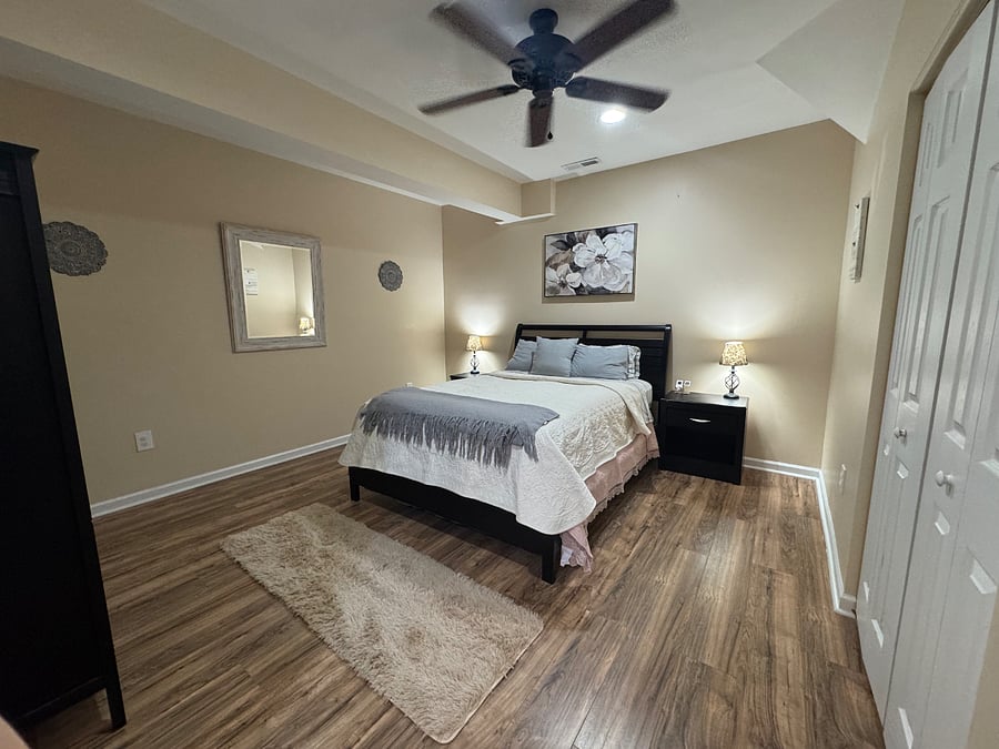 Bedroom #2 (view 1); Queen Bed, 2 nightstands, 2 lamps, armoire, 3-speed ceiling fan and recessed lights