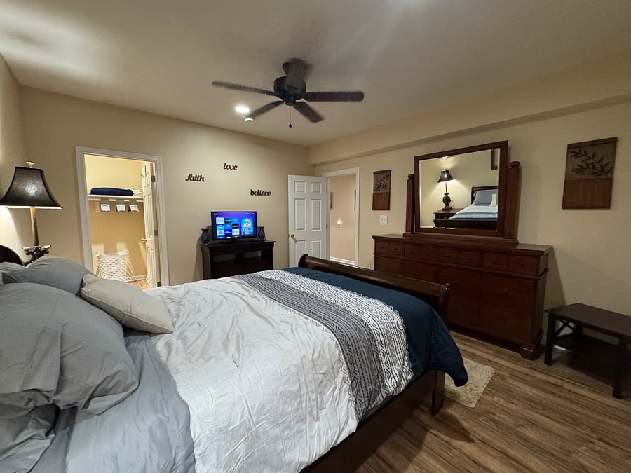 Bedroom #1 (view 2); walk-in closet, small TV with HD Roku stick
