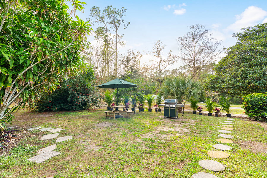 weber grill with outdoor eating area