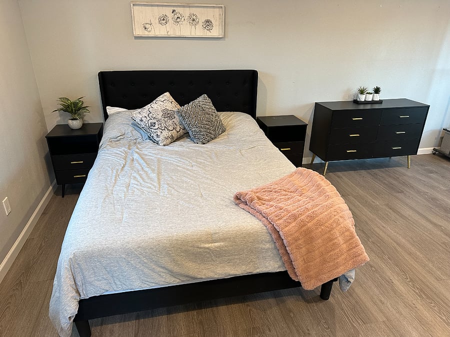 Queen bed with night stands with chargers and dresser