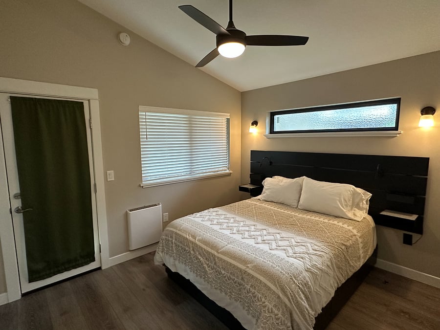 Queen bed with 10" mattress. Storage drawers under bed.