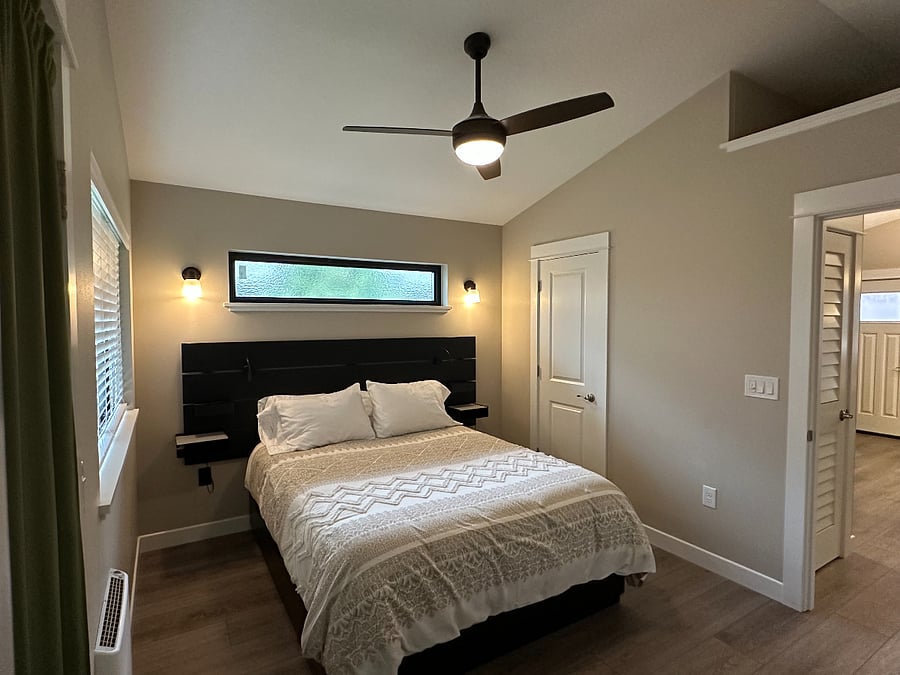 Queen bed with 10" mattress. Storage drawers under bed.