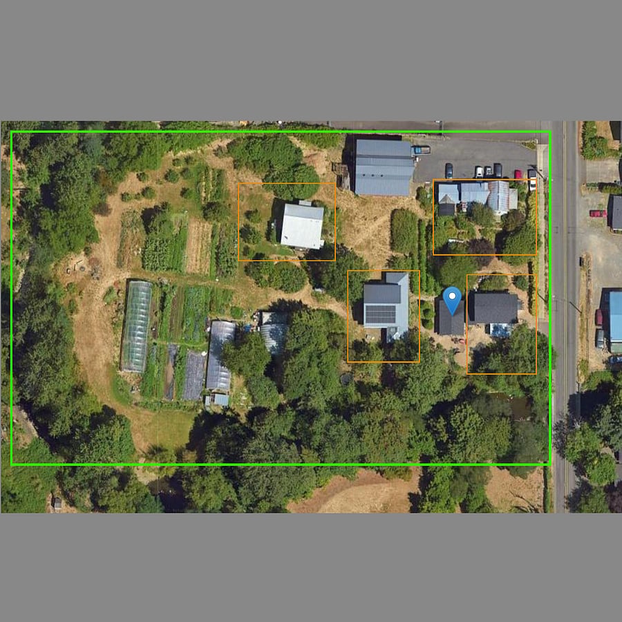 Overview of property. Blue Dot is the cottage. Green area is overall property. Orange areas are the "lots" of the 4 homes in our community. Lots of room to take walks and enjoy the creek and surrounding farm!