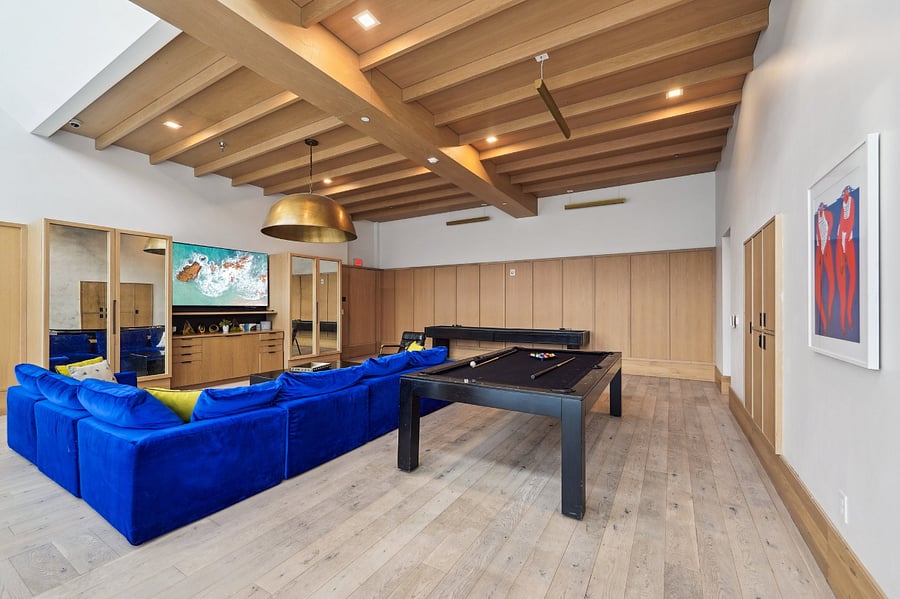 Pool table, games, and seating in the roof top lounge.