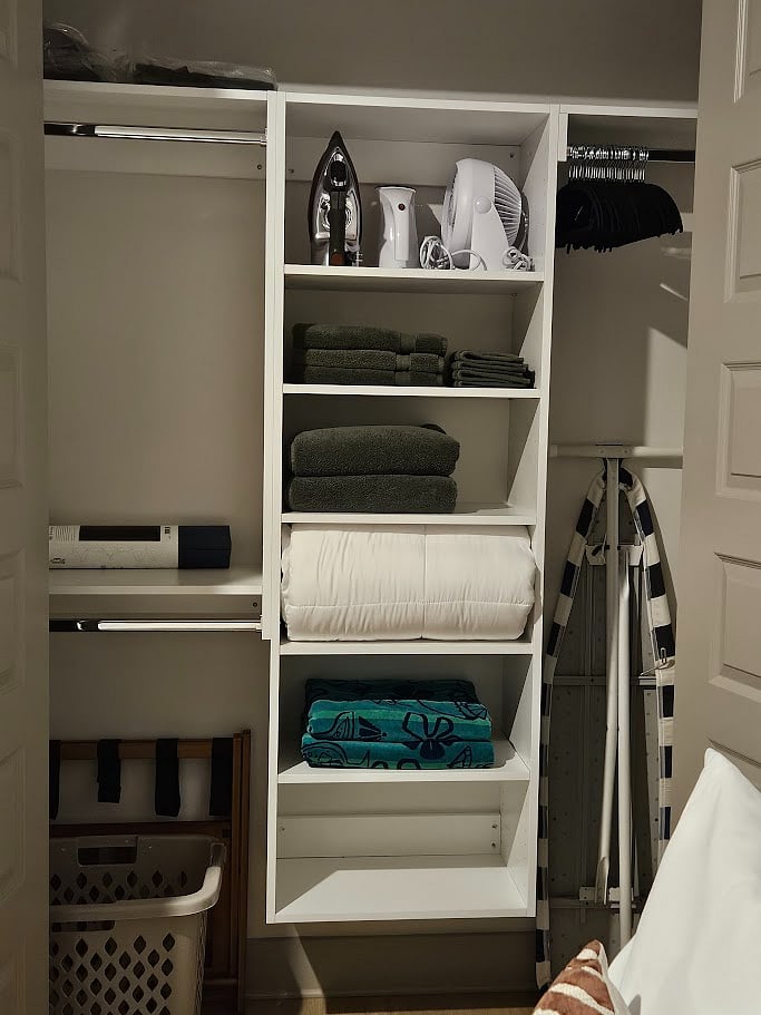 Bathroom and bed linen, full-size ironing board, Chi iron, portable fan, clothing steamer, luggage rack, and yoga mat available in the closet.