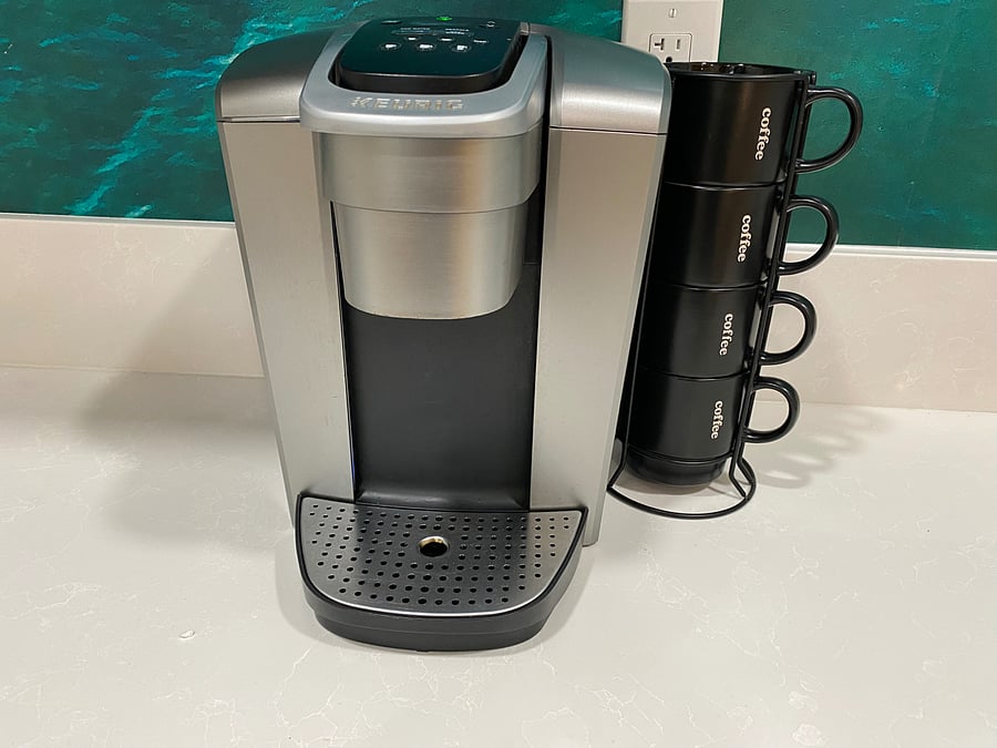 Keurig coffee maker and mugs