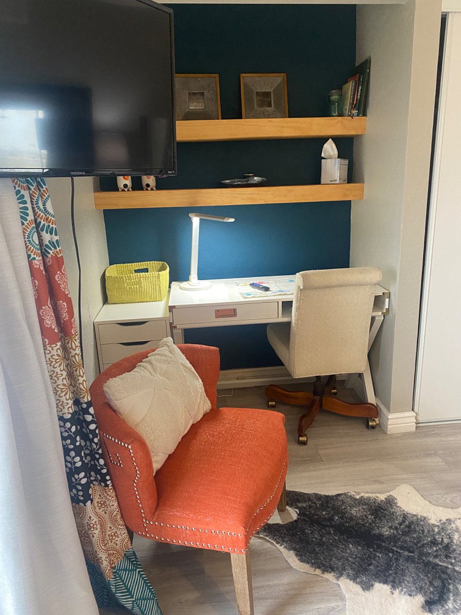 Small desk area in main bedroom.
