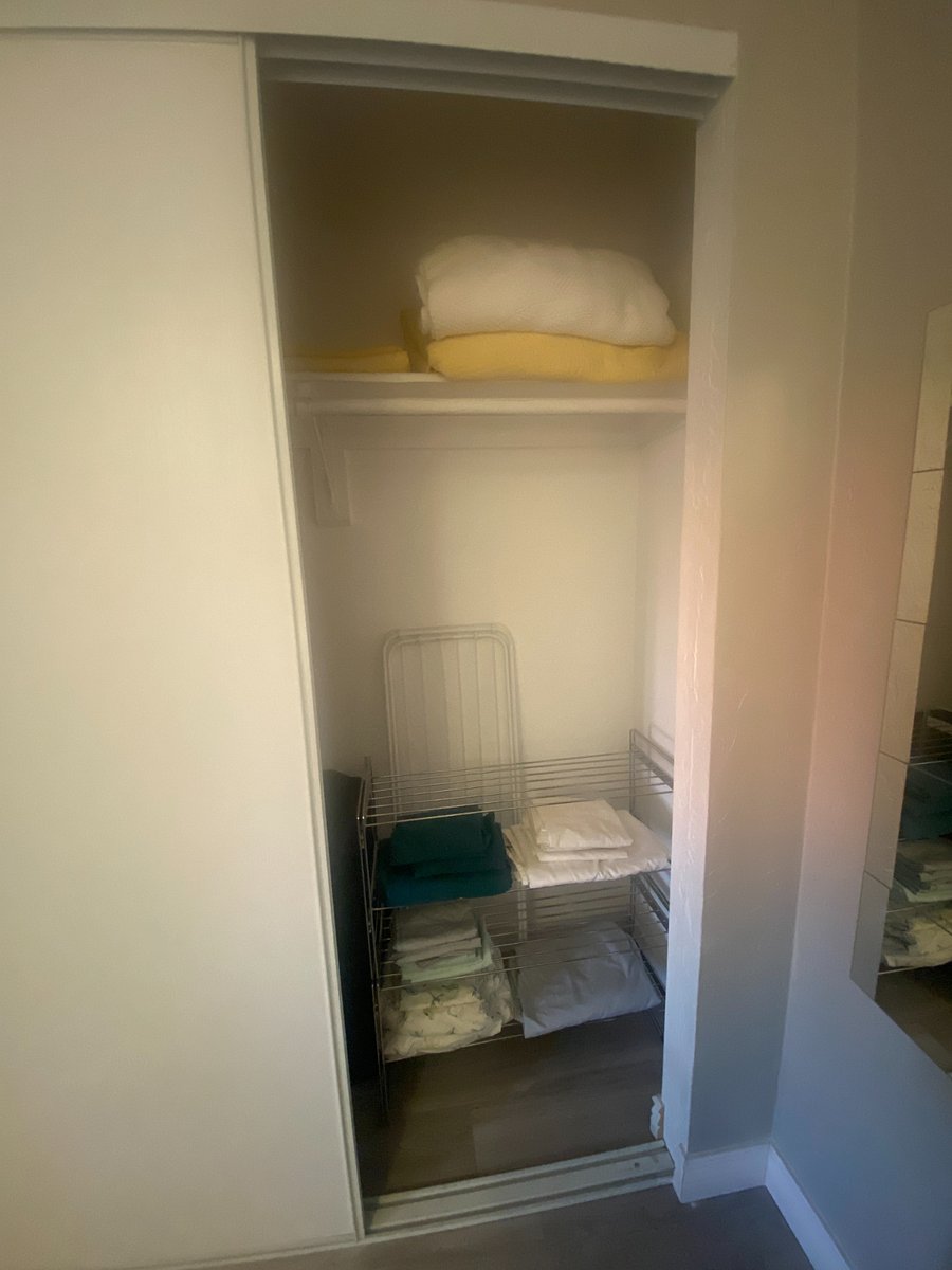 Drying rack and extra linens.
