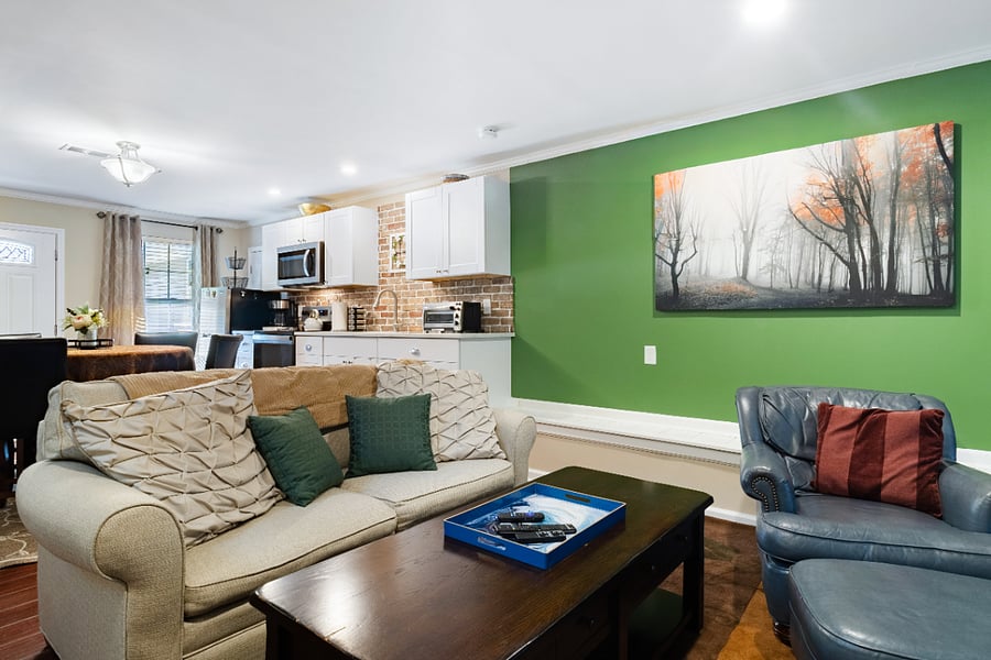 Great room/living room with extra seating and shelves