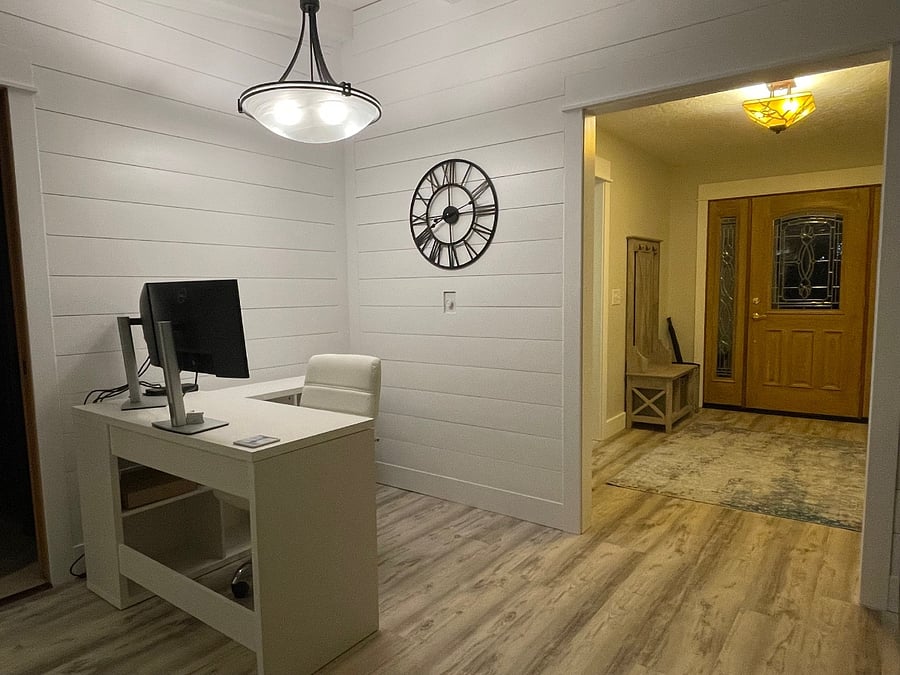 Office adjacent to expansive living room  (photo take from couch - computer monitors excluded during rental). 