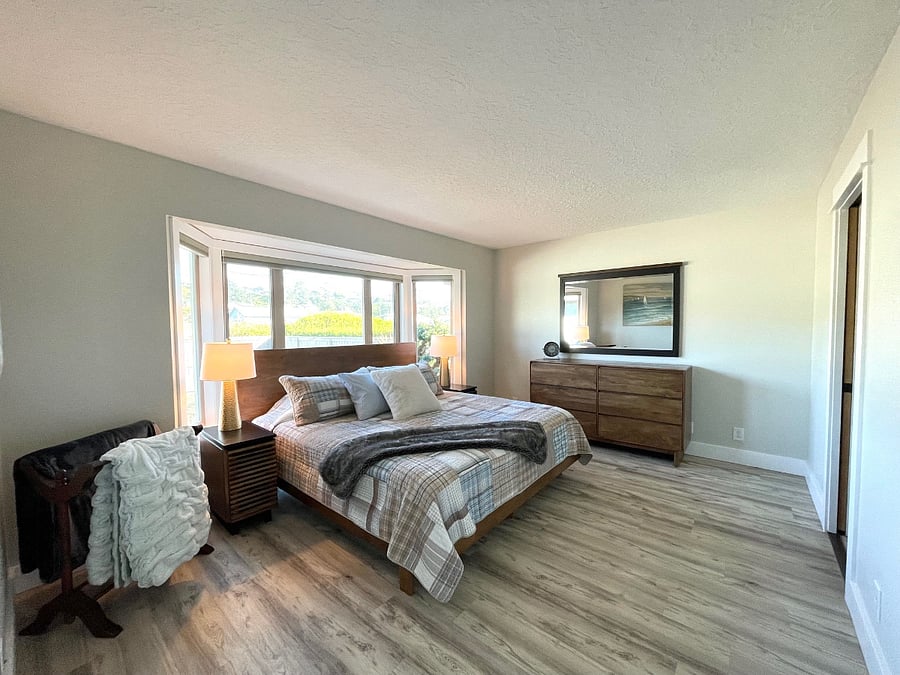 Bedroom #2: Features king-sized bed with  walk-in closet and en-suite bathroom (photo taken bathroom entry).