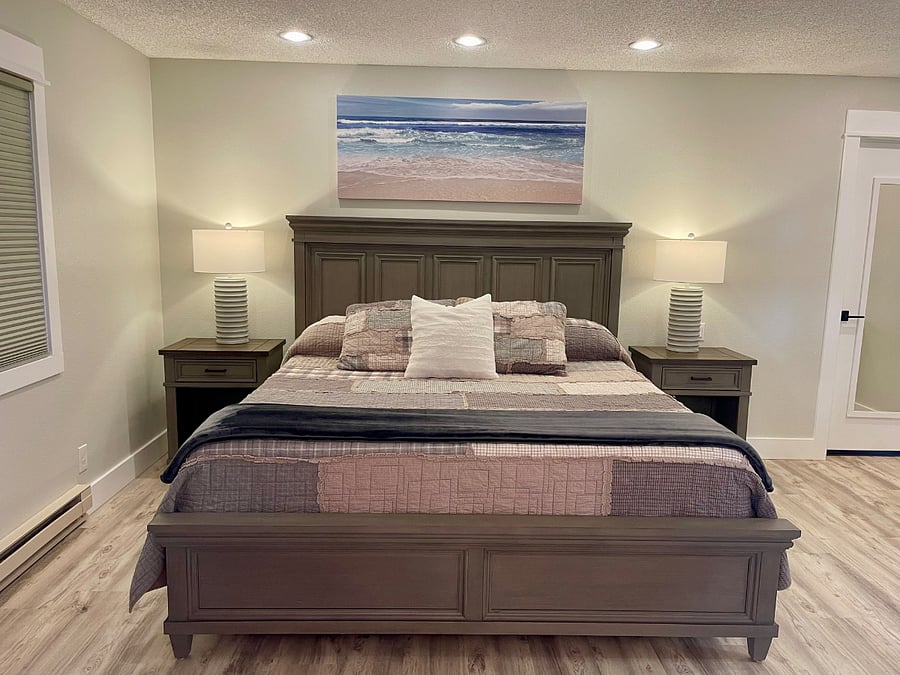 Bedroom #1 offers tons of space, king-sized bed, twin pull-out sleeper soft, en-suite bathroom, lots of closet space and smart TV.