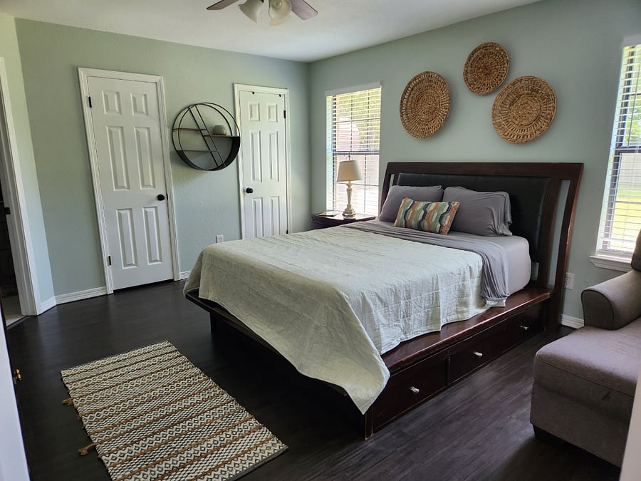 Master bed with his and hers closets. Roku TV here