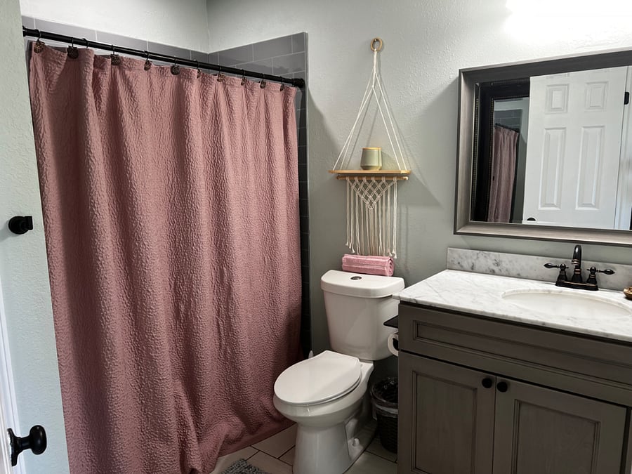 Master bath. attached to master room. Is only walk in shower. no tub
