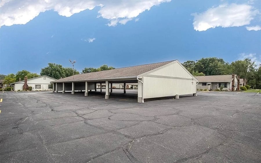 Unit comes with one carport available.  Additional parking directly outside home and throughout parking lot.