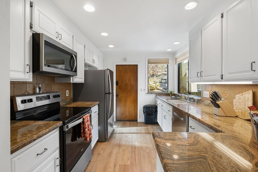 A fully equipped kitchen with modern appliances, ample counter space, and all the essentials, making it easy and enjoyable to prepare delicious meals.