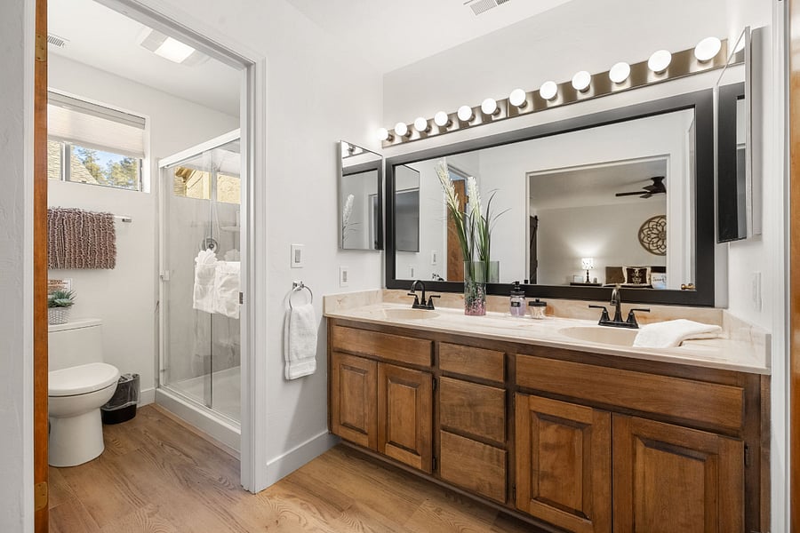 The master ensuite bath features double vanities, offering both style and convenience.