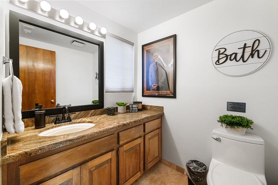 A convenient half bath on the main floor, perfect for guests and added comfort during your stay.