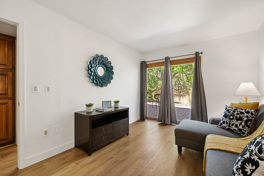 Bedroom 3 | Backyard Access
Bright, airy space with a cozy pull-out sofa and sliding doors that open directly to the backyard- perfect for enjoying peaceful views and easy access to nearby trails.