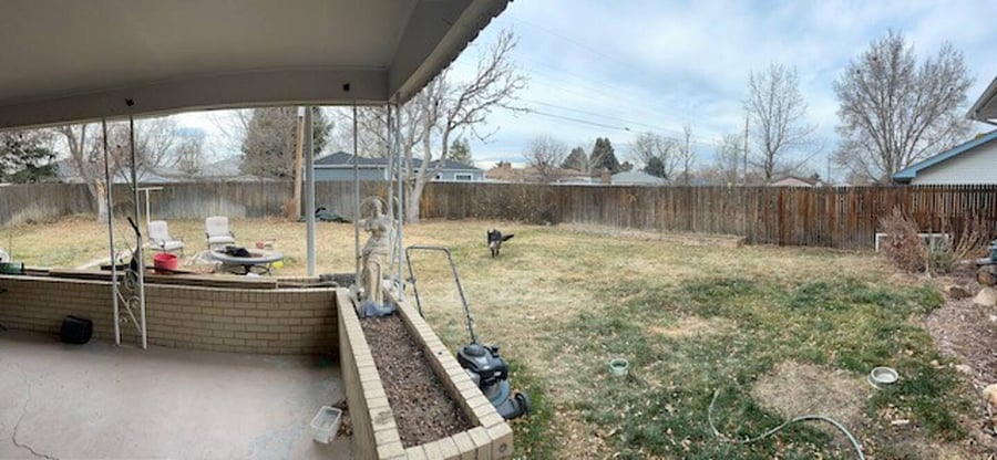 Large fenced backyard and private covered patio area