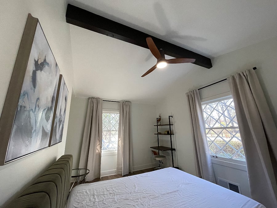 Bedroom 1- Queen with working station and beautiful windows overlooking the park. 