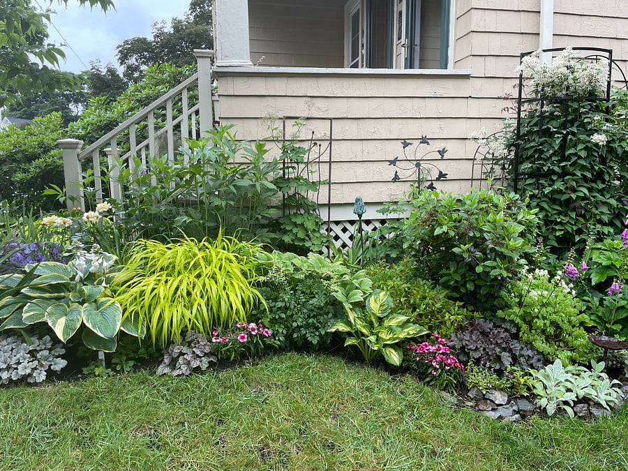 Beautifully landscaped with perennial gardens
