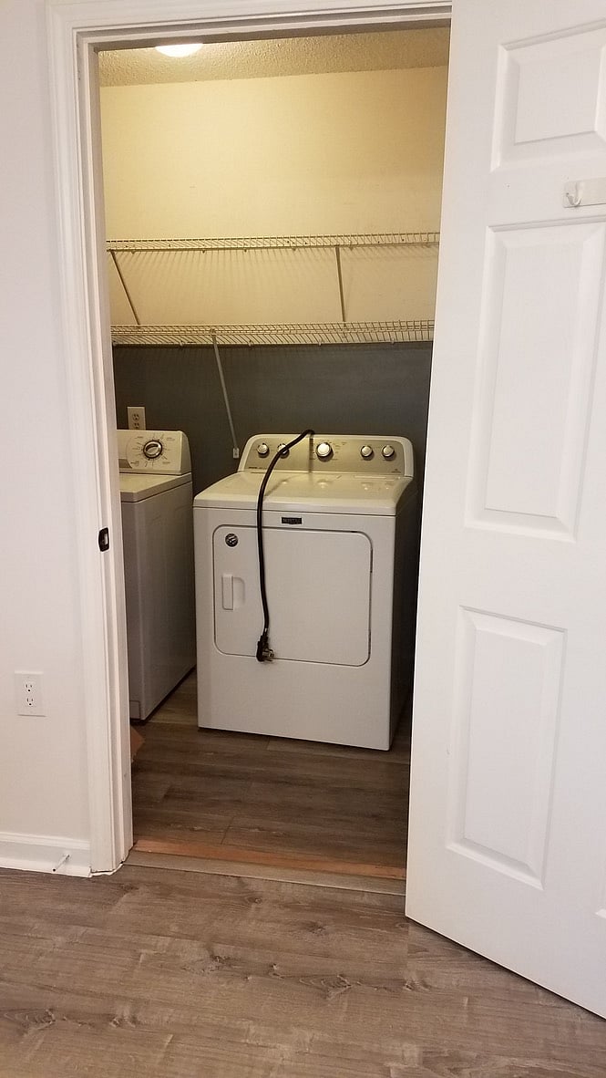 Laundry is very accessible and just off of the kitchen. The washing machine is LARGE...and updated (not shown in pic).