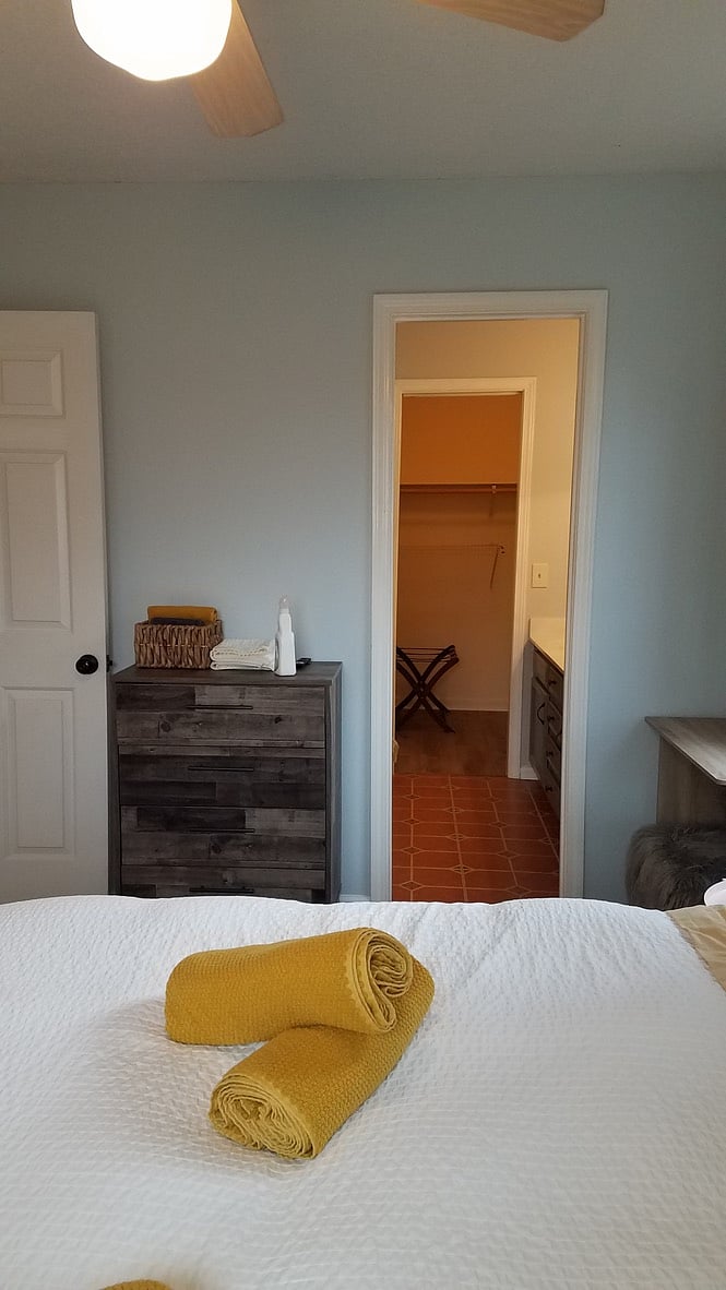 Master bedroom looking into the bathroom and large walk in closet. Double sinks and full bath.