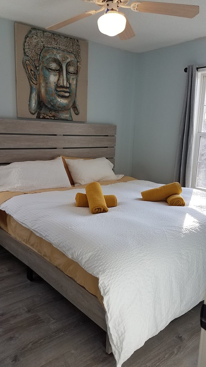 Plush king bed in master suite