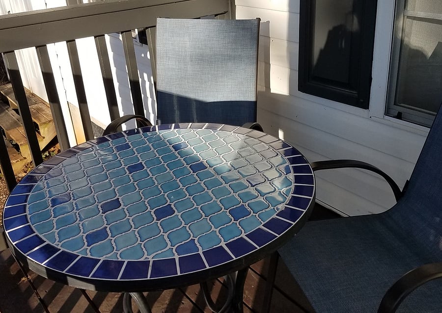 Outdoor table (trees and bush surround you and is private).