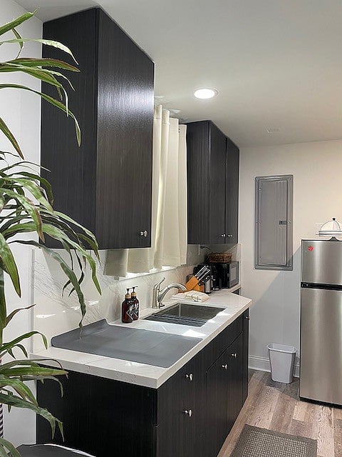 Kitchenette area: induction cooktop, Microwave, Coffee maker, toaster, and Air fryer.