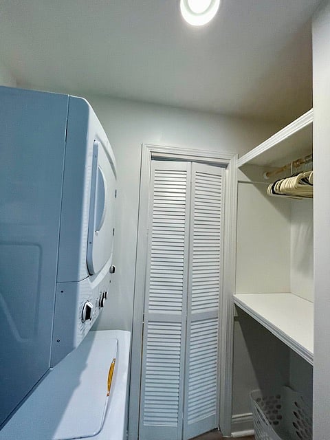 Washer/dryer, and a clothes hanger area.