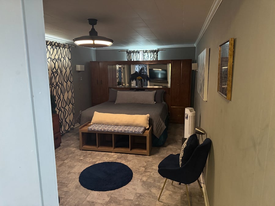 Master Bedroom - King-sized bed.