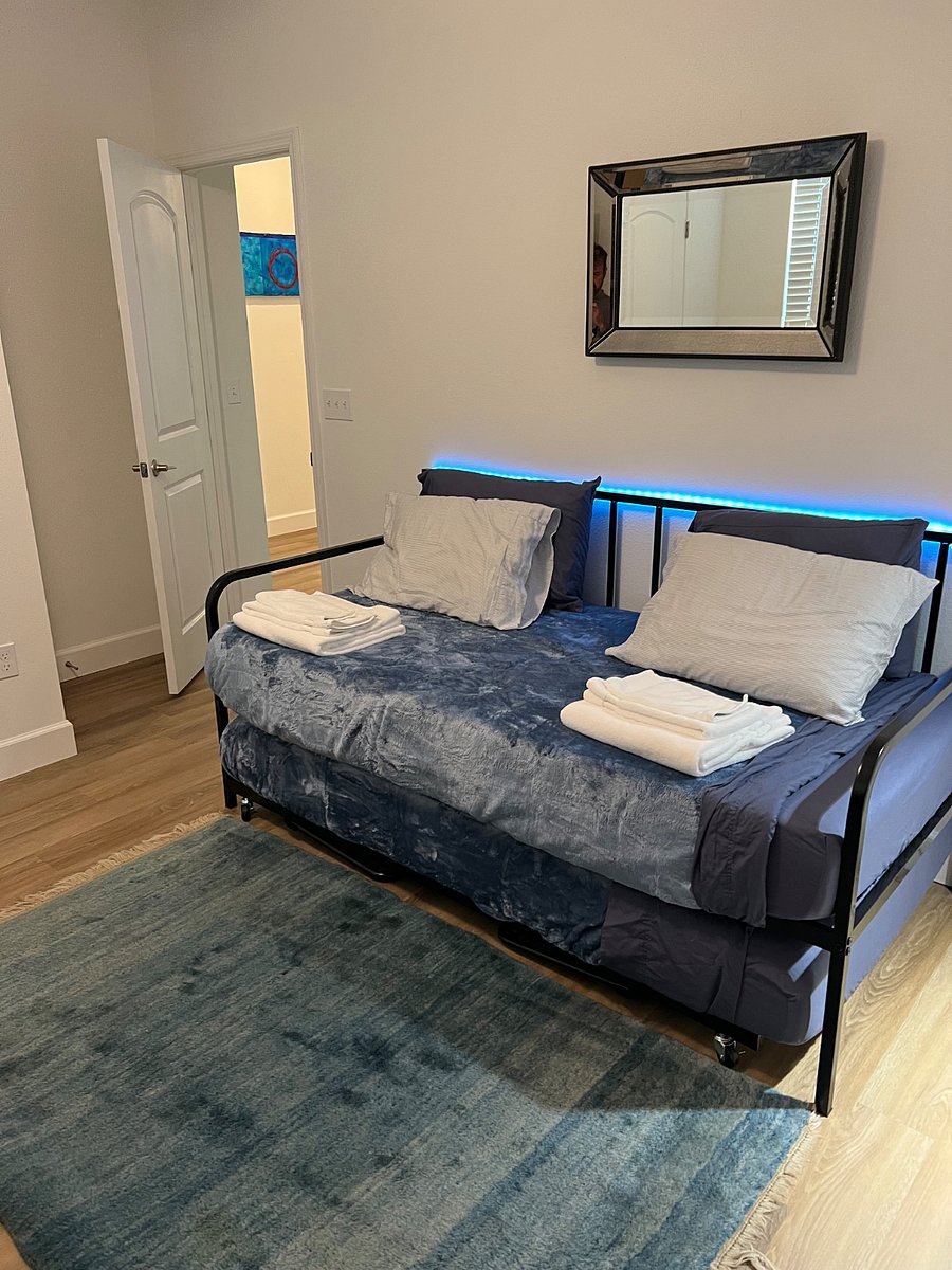 Two twin beds can be raised to form one queen bed. This room includes a desk with space for your laptop and printer 
