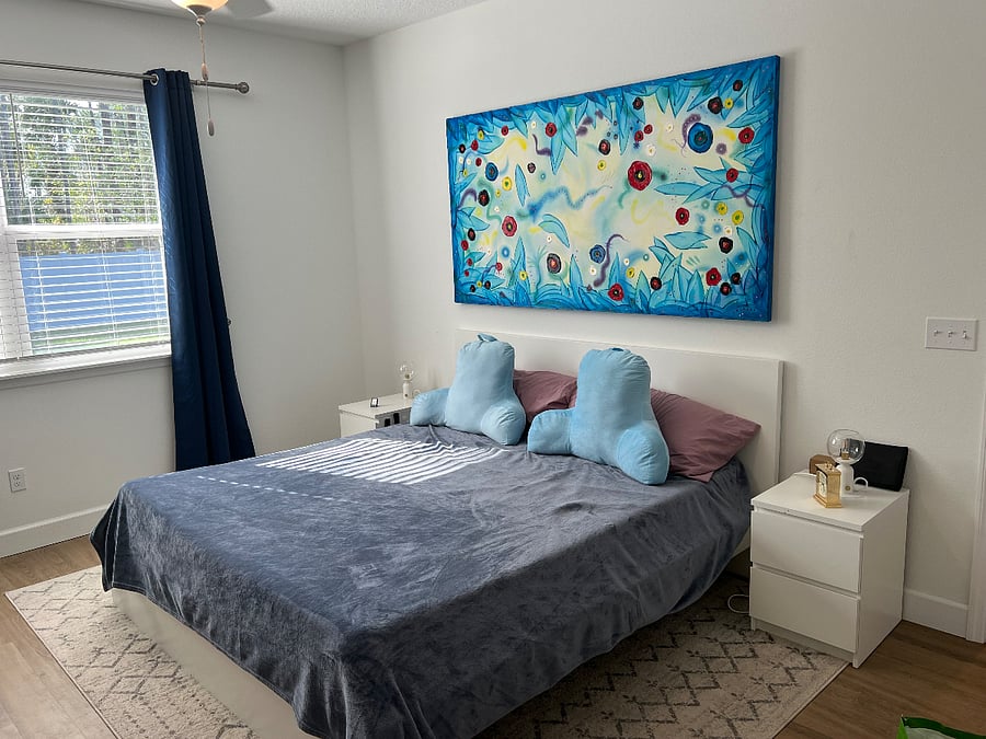 Main bedroom with curtains that block all light when you so desire. 