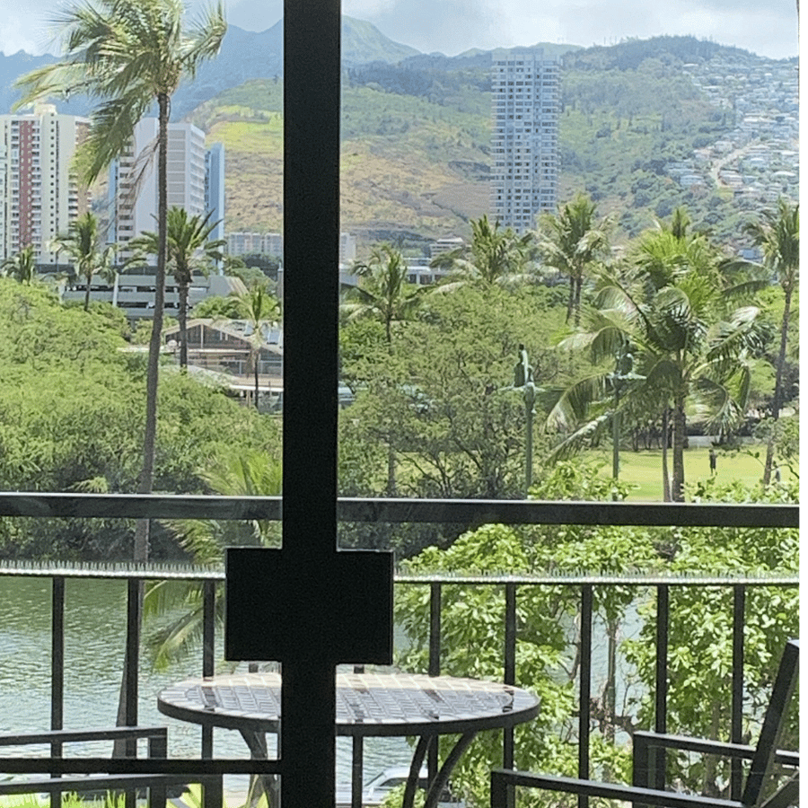 Enjoy the lanai with direct views of the Ala Wai canal, golf course and mountains.