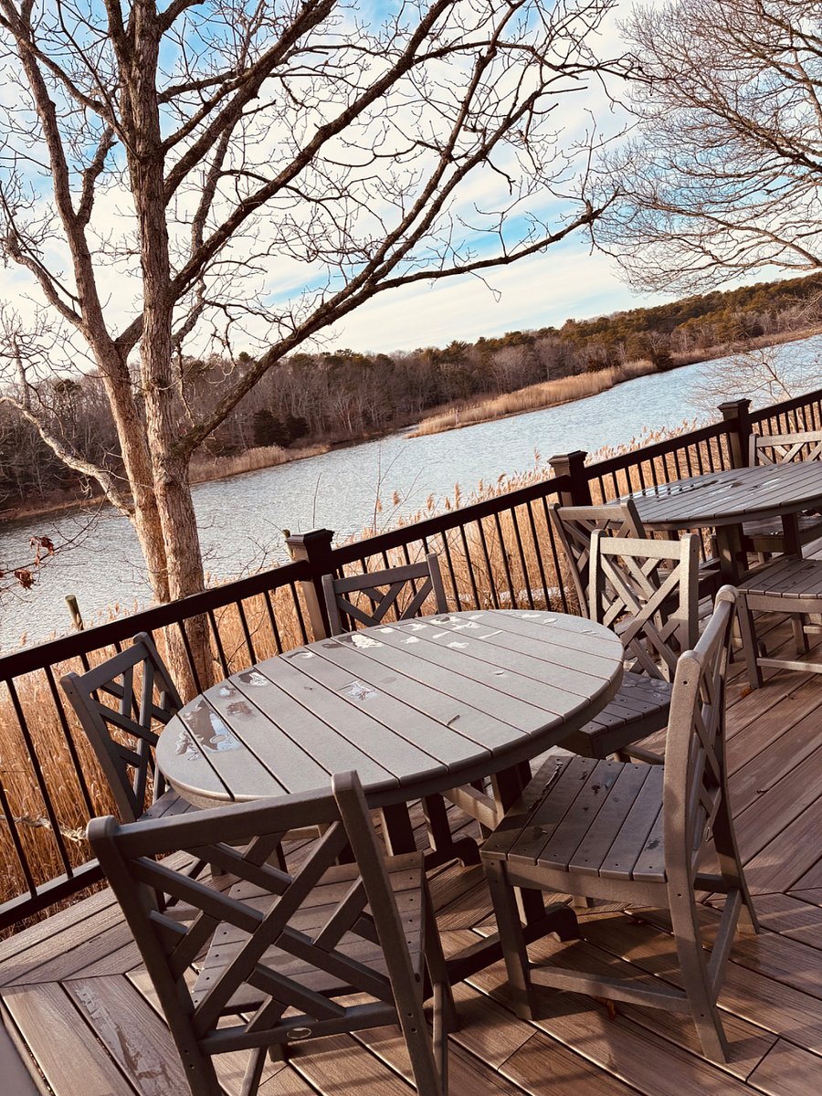 wrap around patio with outdoor seating, patio umbrella included
