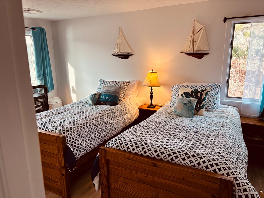 twin bedroom with desk, TV with Roku