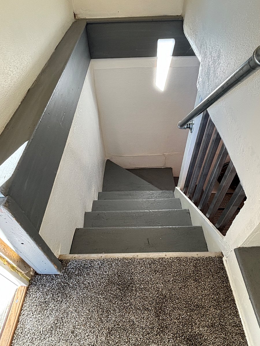 Stairway to the washer/dryer in the basement.
