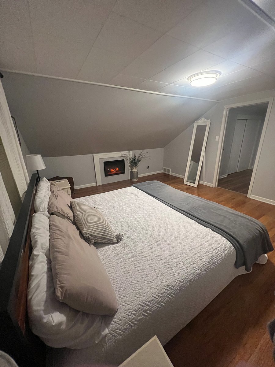 main bedroom and fireplace in bungalow