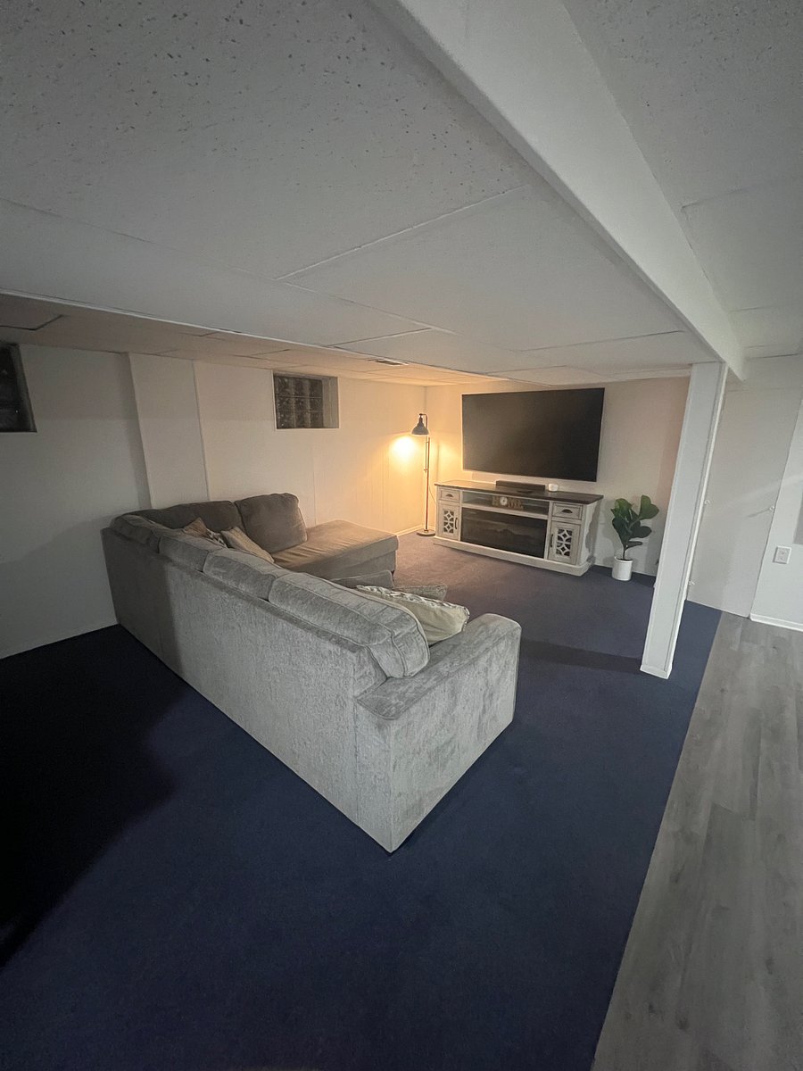big sectional with 75 inch TV for hosting/entertaining