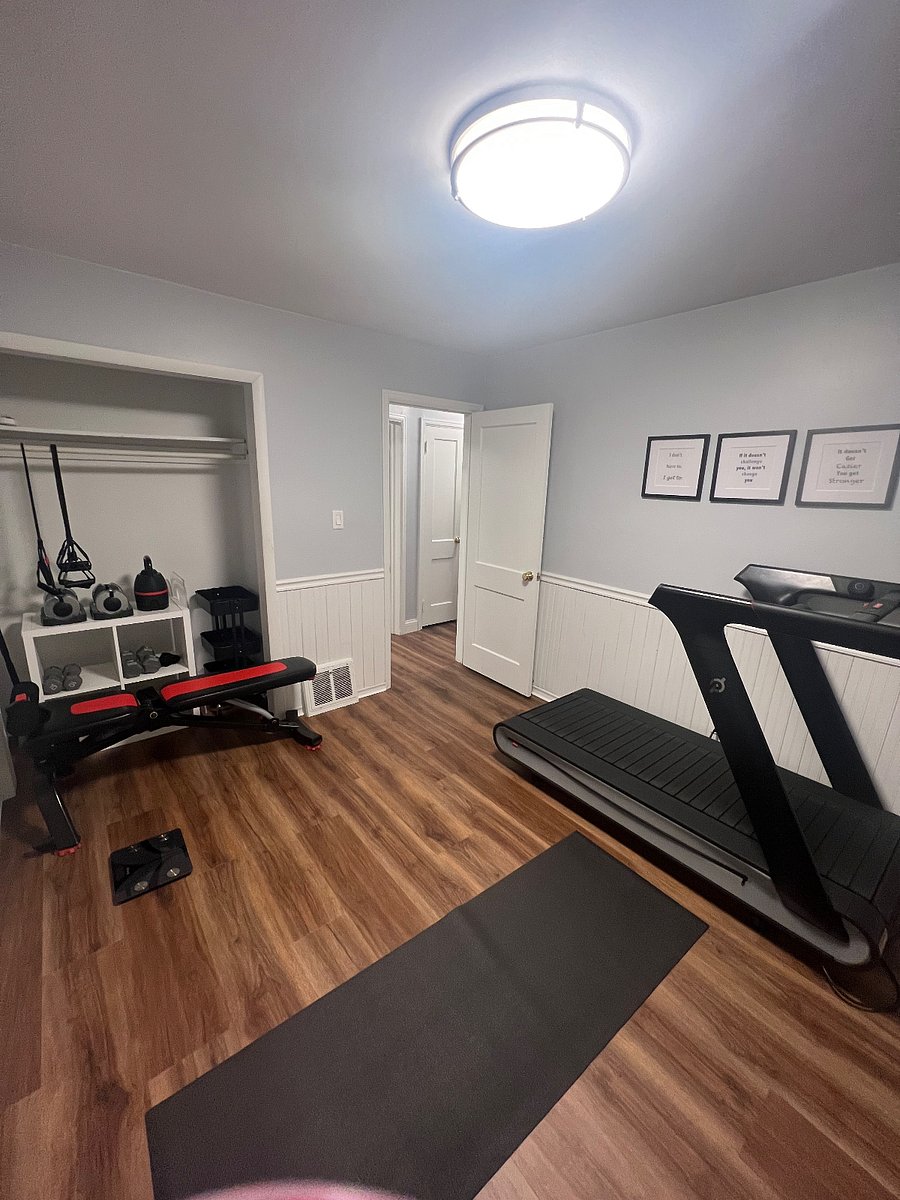 in home gym! Peloton treadmill, weights and much more. This room can also be converted to a bedroom upon request.