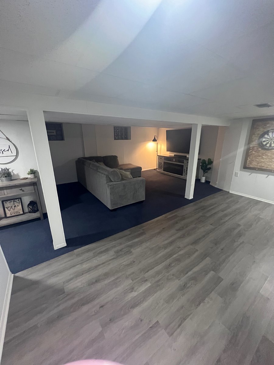 basement entertainment area with lots of space.