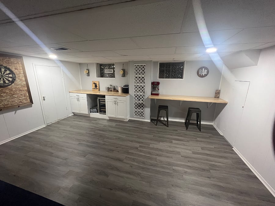 Basement bar area with dart board