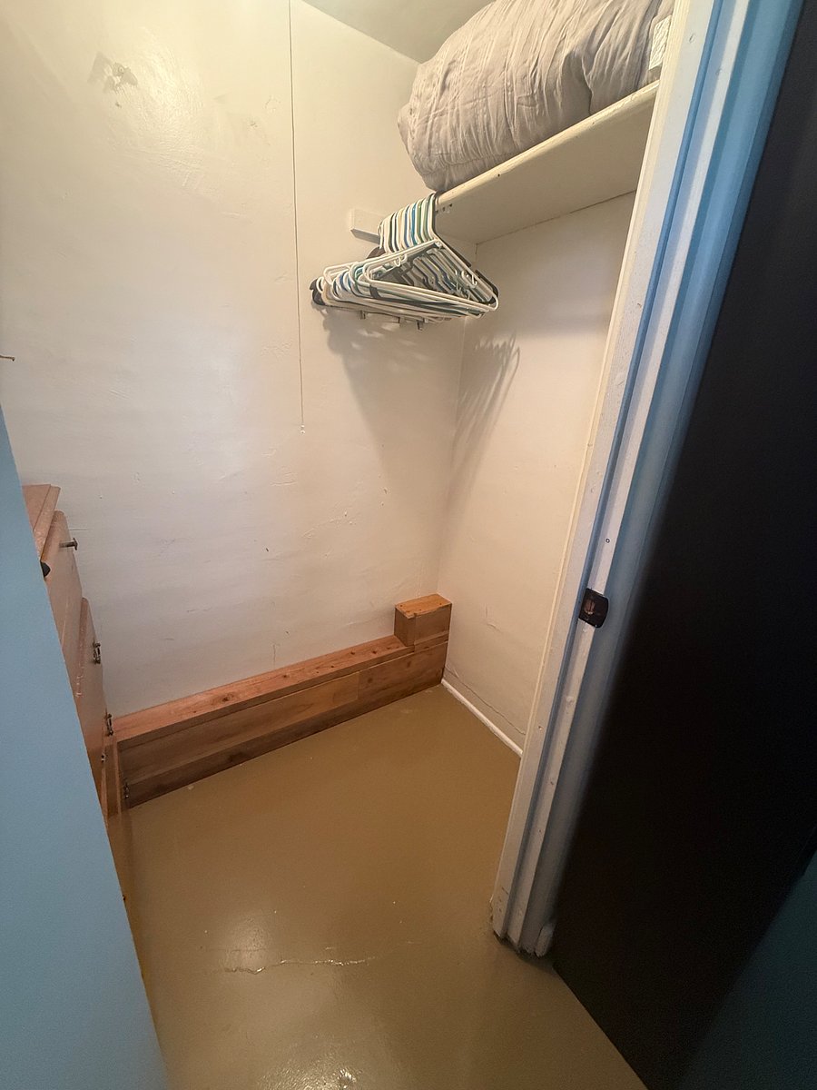 Guest room closet with chest of drawers.
