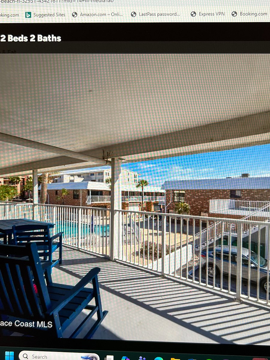 Patio with dining table overlooking pool. Nice for quiet enjoyment.. Not a place for loud parties here.
