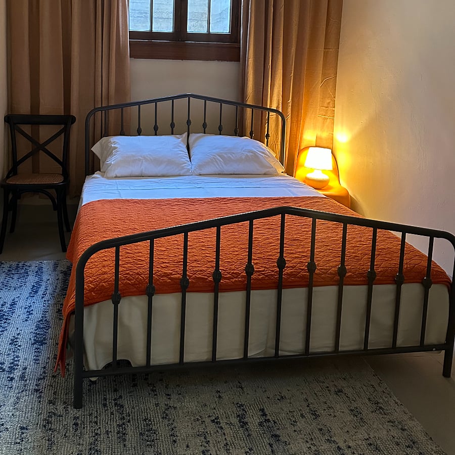 Comfortable queen bed with high thread-count sheets. You will have excellent sleep here.