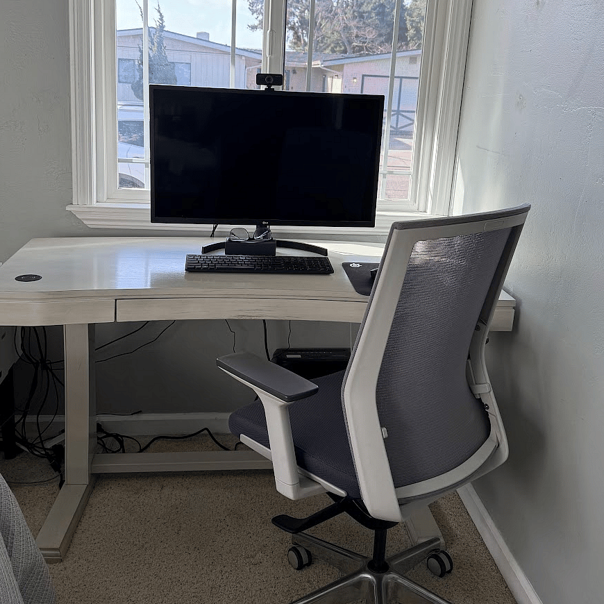Dedicated home office with sit/stand desk and large monitor. 1 Gig high speed Internet access.