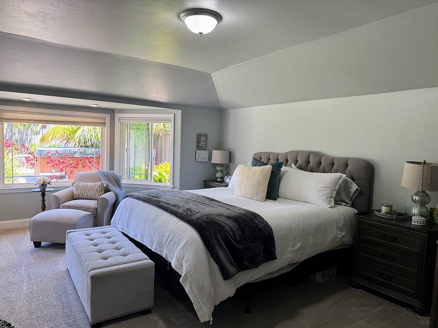 Primary bedroom with views to the garden.